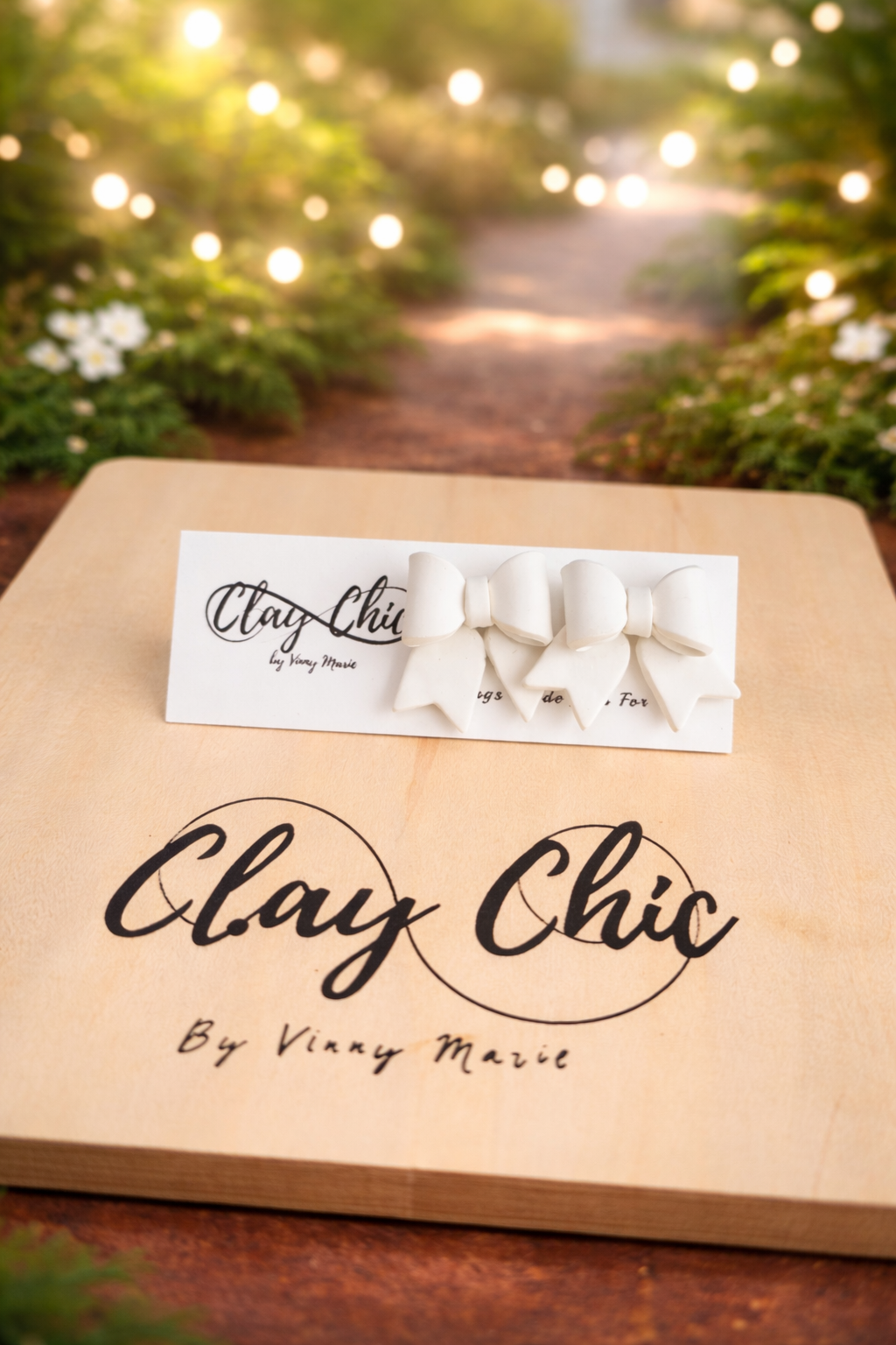 POLLY IN SPRING BOW STUDS