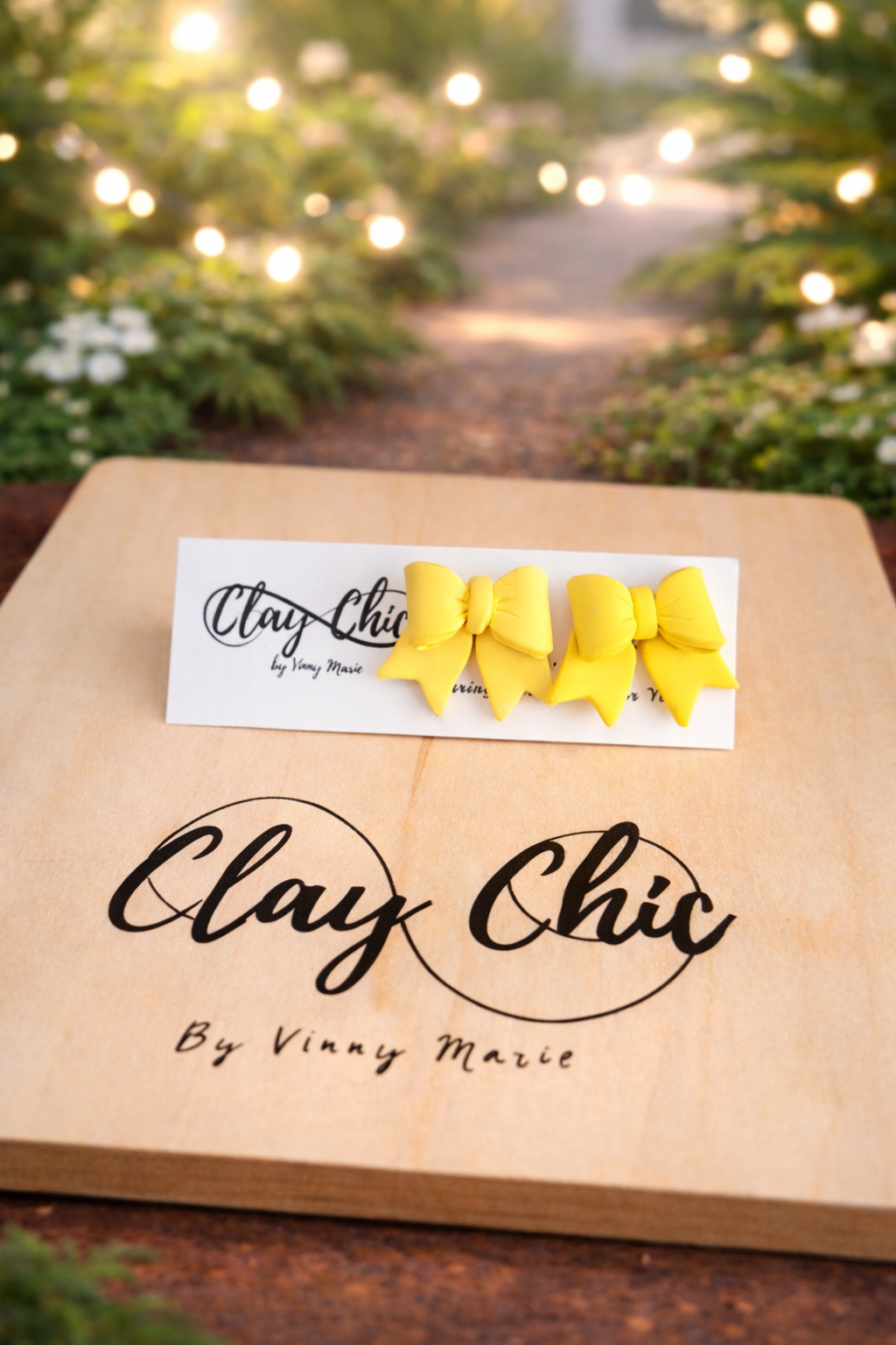 POLLY IN SPRING BOW STUDS