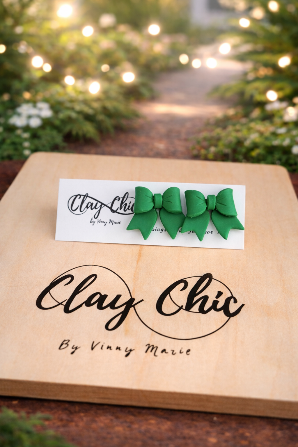 POLLY IN SPRING BOW STUDS