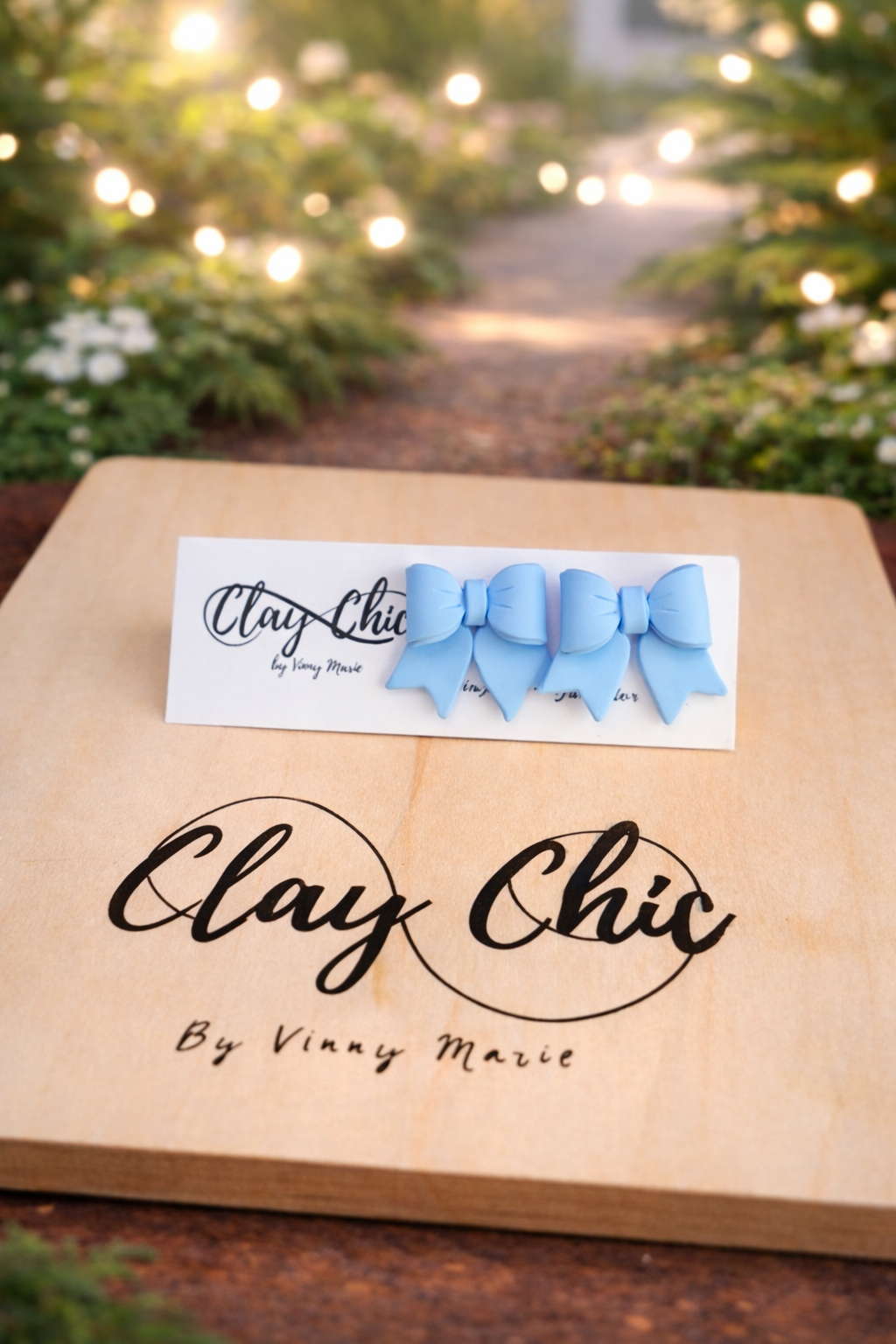 POLLY IN SPRING BOW STUDS